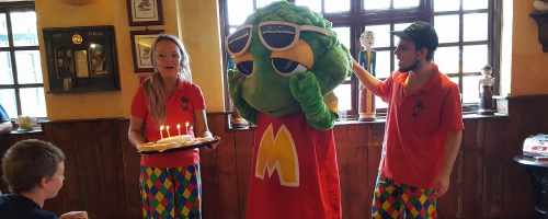 Morris Minor with a birthday cake