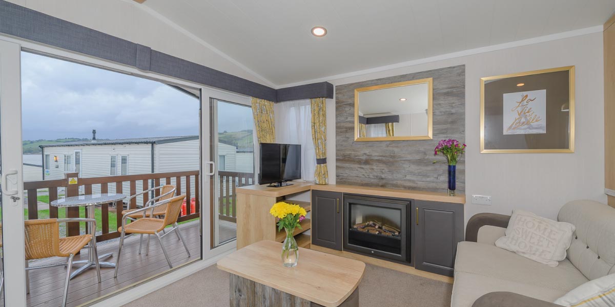 Waverley Gold Plus living area and balcony (Waverley Platinum Caravan)